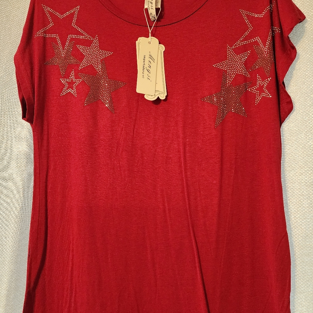 I'm selling a blouse, size medium, brand Mengsi.